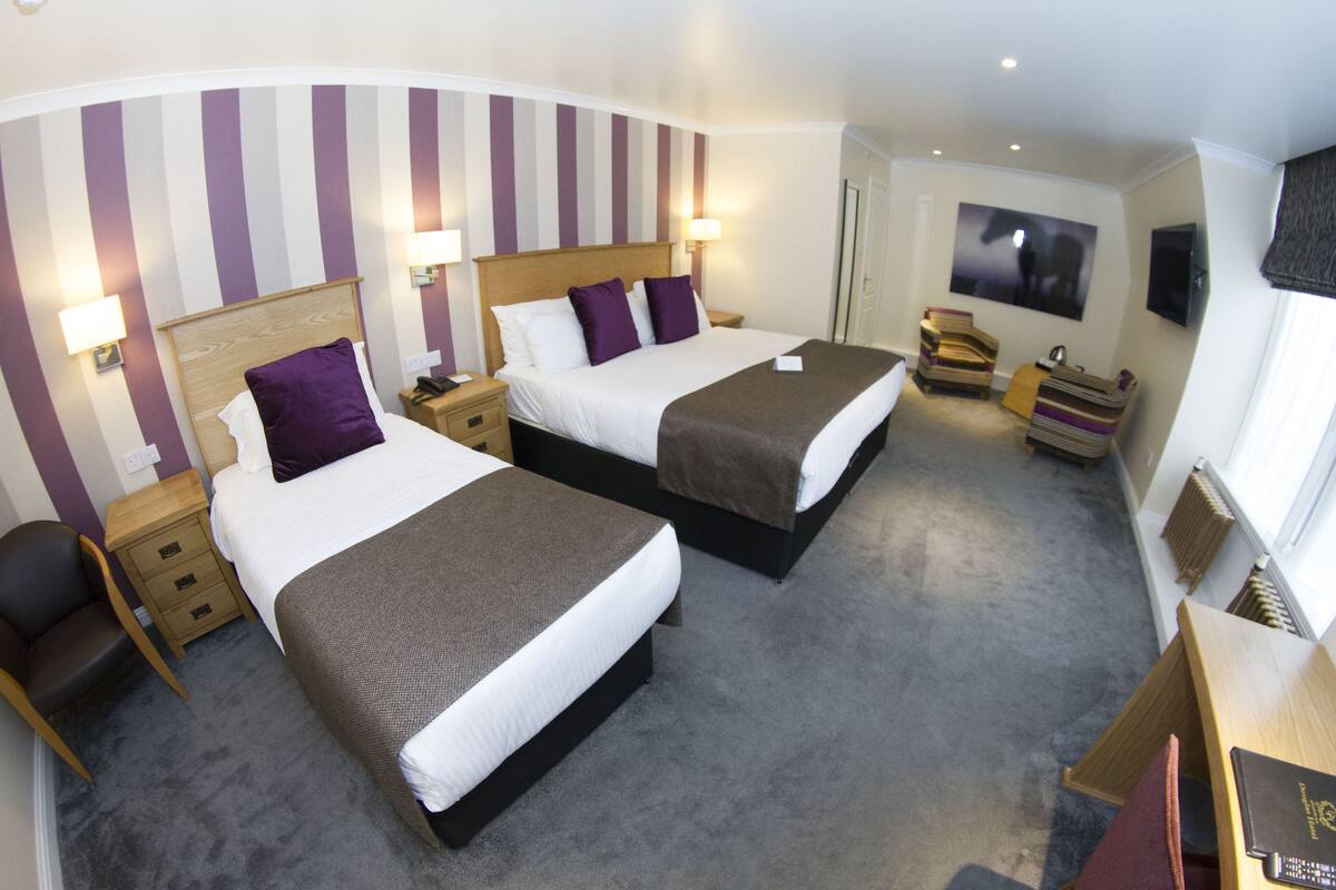 Family Room, Multiple Beds | Desk, iron/ironing board, WiFi (free), bed sheets