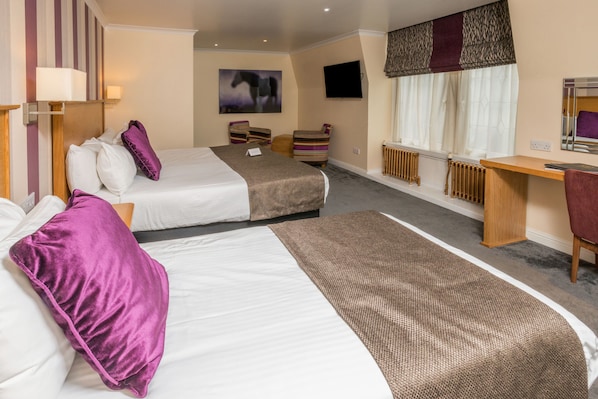 Family Room, Multiple Beds | Desk, iron/ironing board, free WiFi, bed sheets