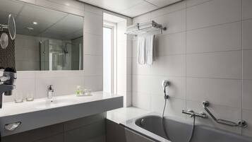 Shower, eco-friendly toiletries, hair dryer, towels