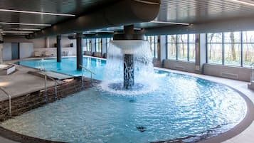 Indoor pool, open 7:00 AM to 9:00 PM, pool loungers