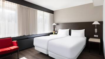 Coffres-forts dans les chambres, bureau, draps fournis