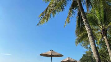 On the beach, free beach cabanas, sun-loungers, beach towels