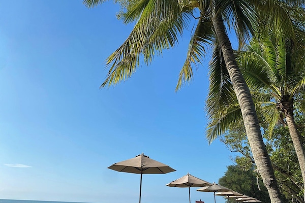 On the beach, free beach cabanas, sun loungers, beach towels