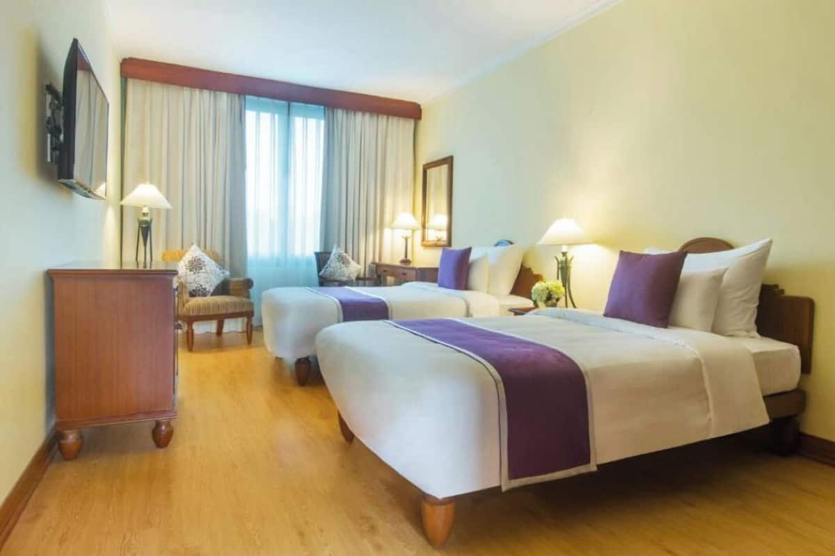 Habitación Deluxe con 2 camas individuales | 1 habitación y artículos del minibar gratis
