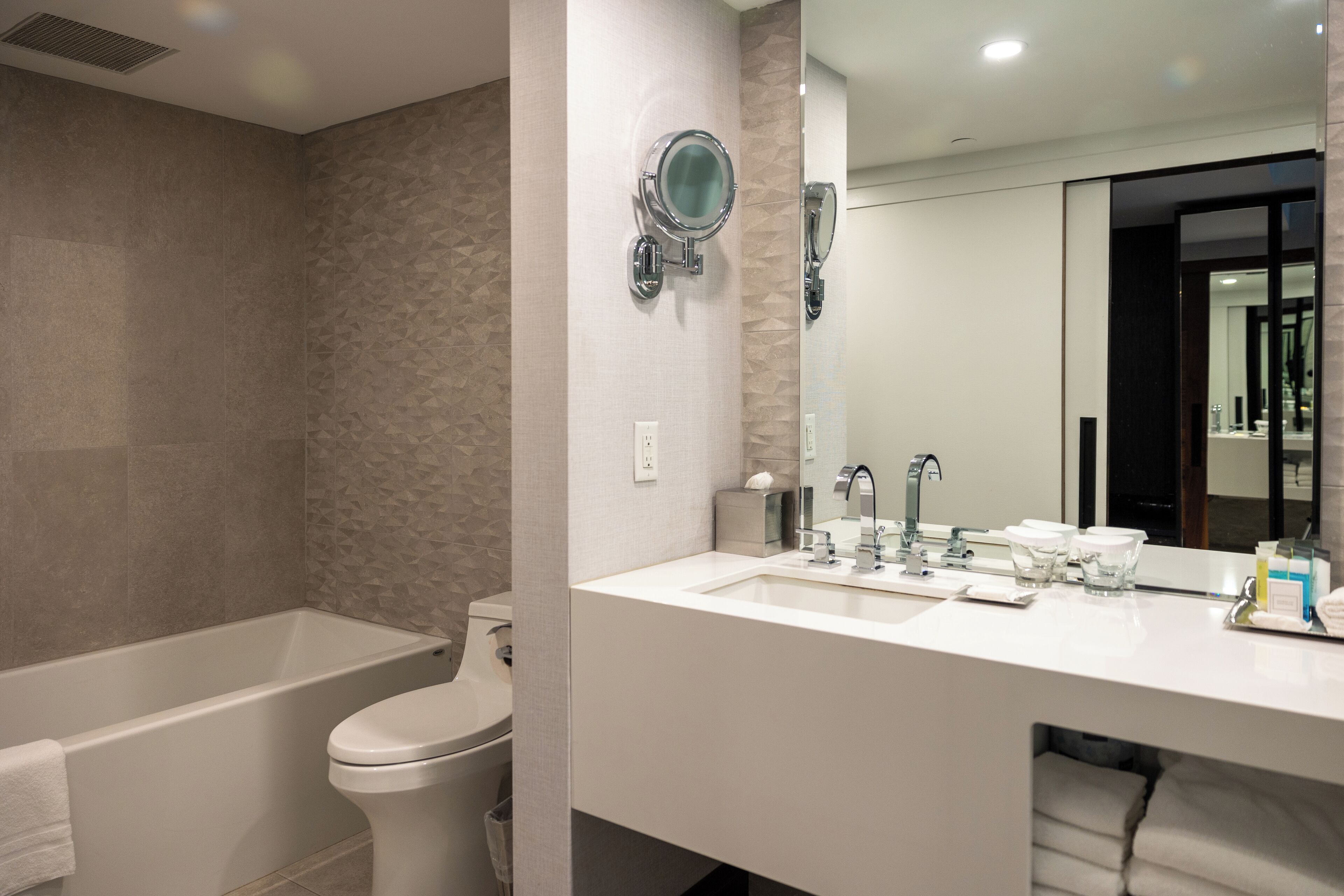 presidential suite | bathroom | combined shower/bathtub, designer toiletries, hair dryer, bathrobes