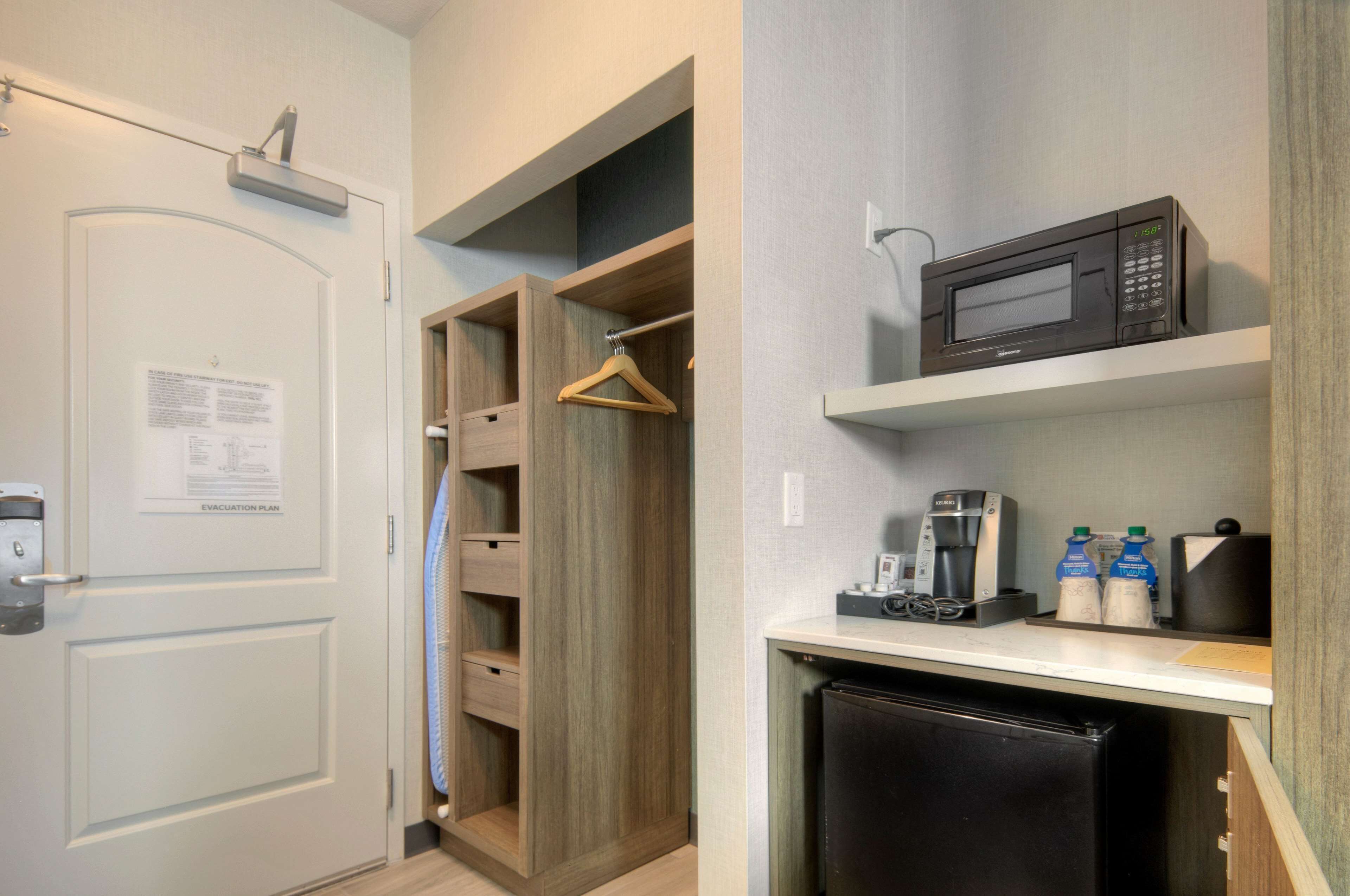 desk, laptop workspace, iron/ironing board, free cots/infant beds