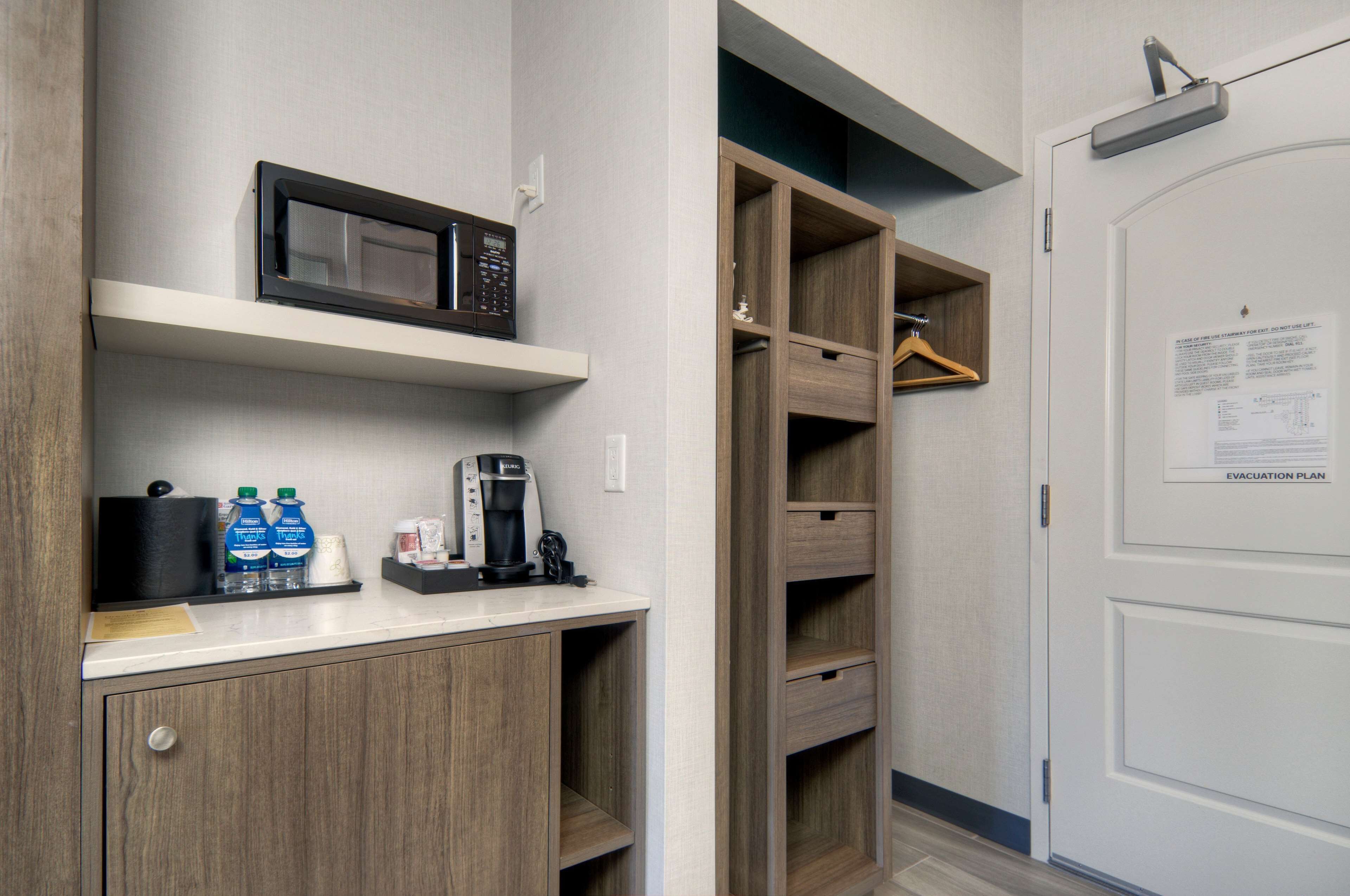 desk, laptop workspace, iron/ironing board, free cots/infant beds