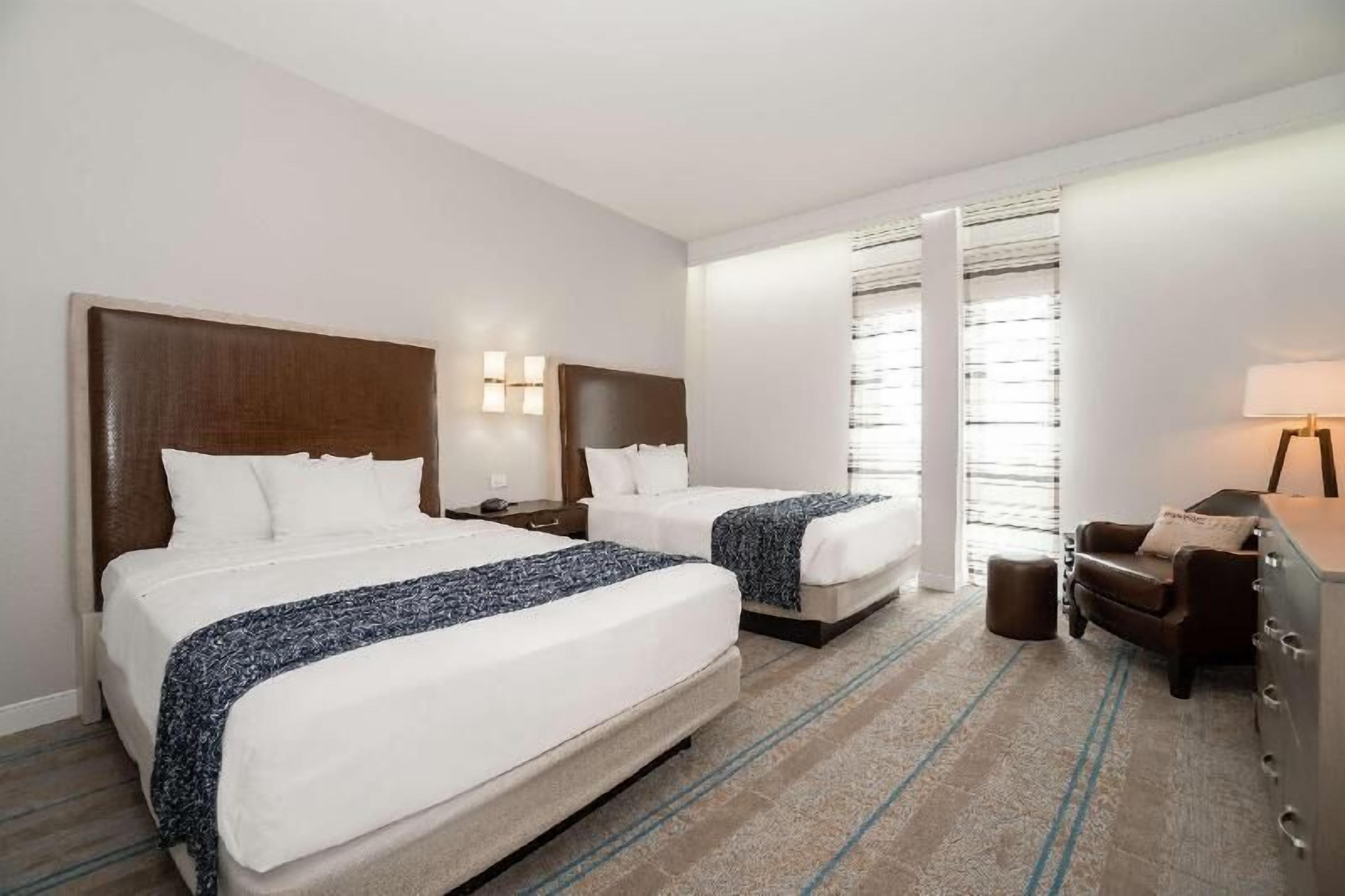 Premium bedding, pillow-top beds, in-room safe, desk