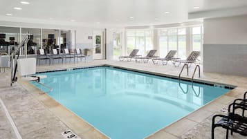 Indoor pool, open 6 AM to 10 PM, pool loungers