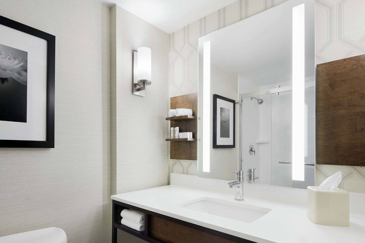 Bathroom | Bathtub, hair dryer, towels