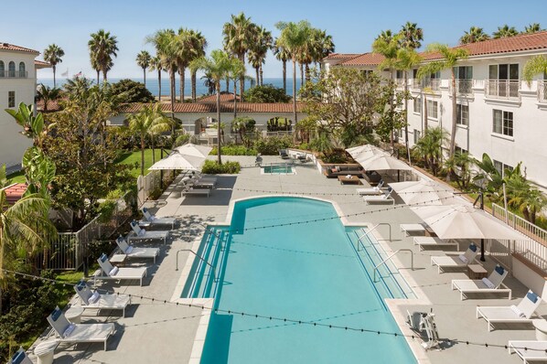 Outdoor pool, pool umbrellas, sun loungers
