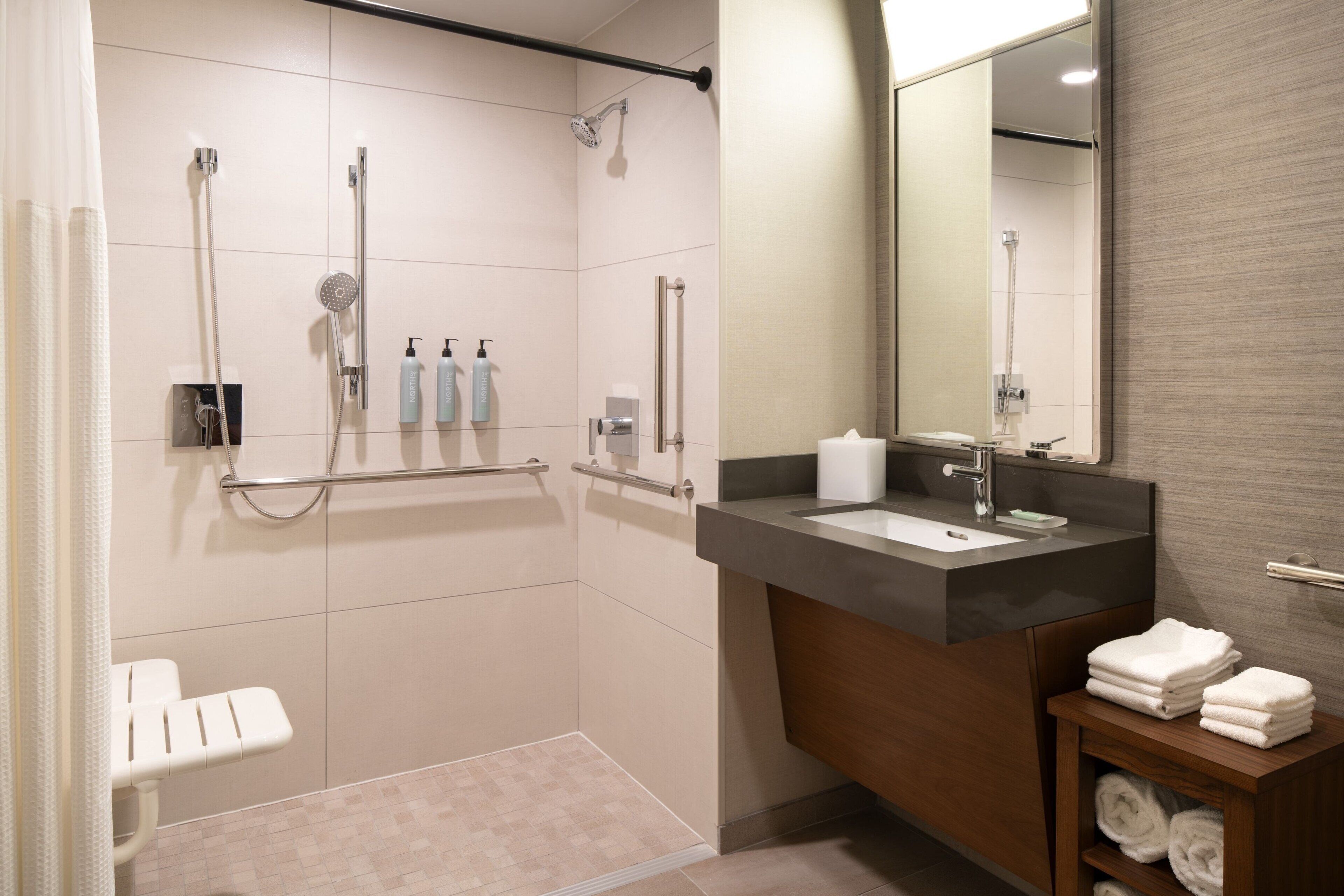 combined shower/bathtub, free toiletries, hair dryer, towels