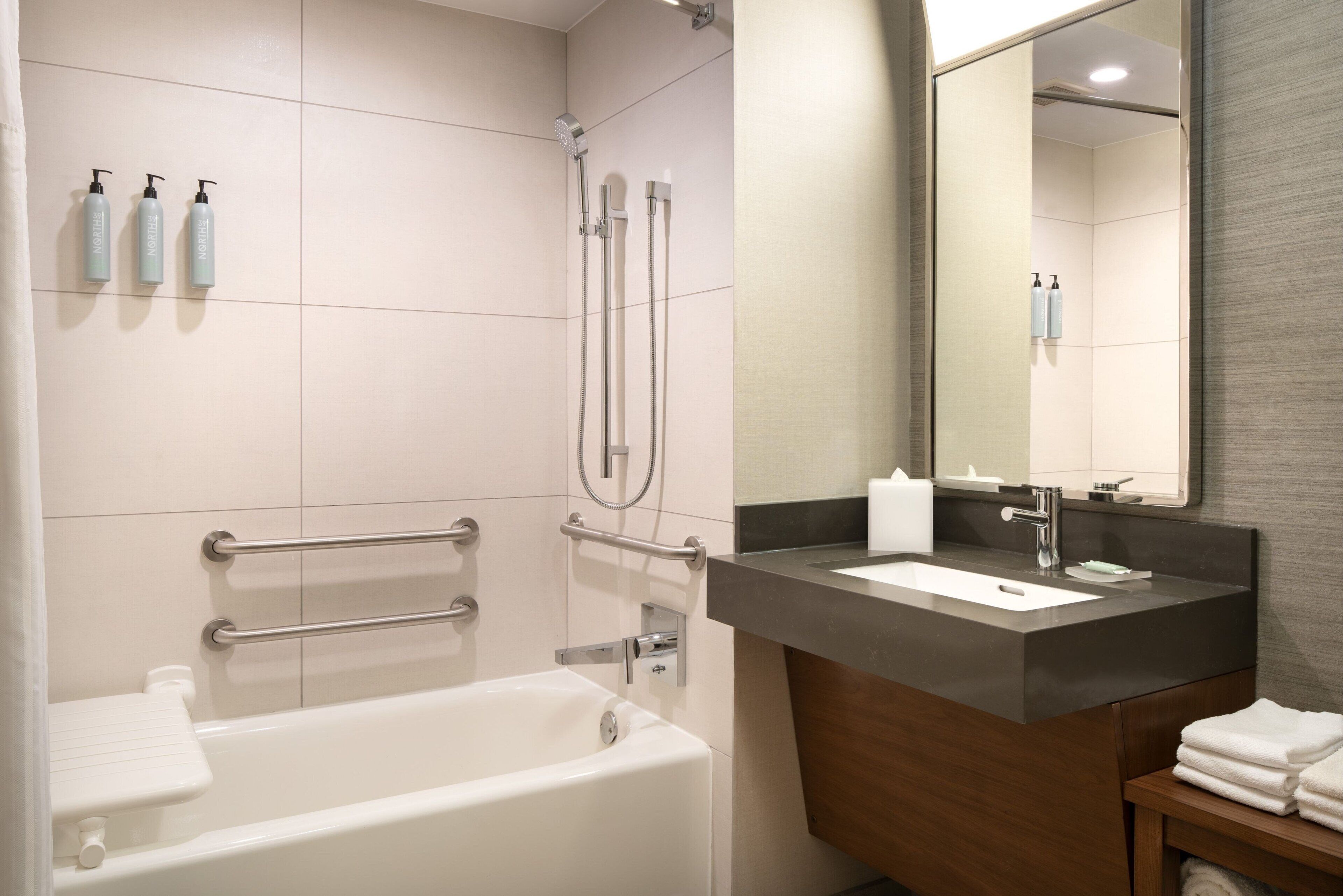 Standard Room, 2 Queen Beds (Mobility Accessible, Tub) | Bathroom | Combined shower/bathtub, free toiletries, hair dryer, towels