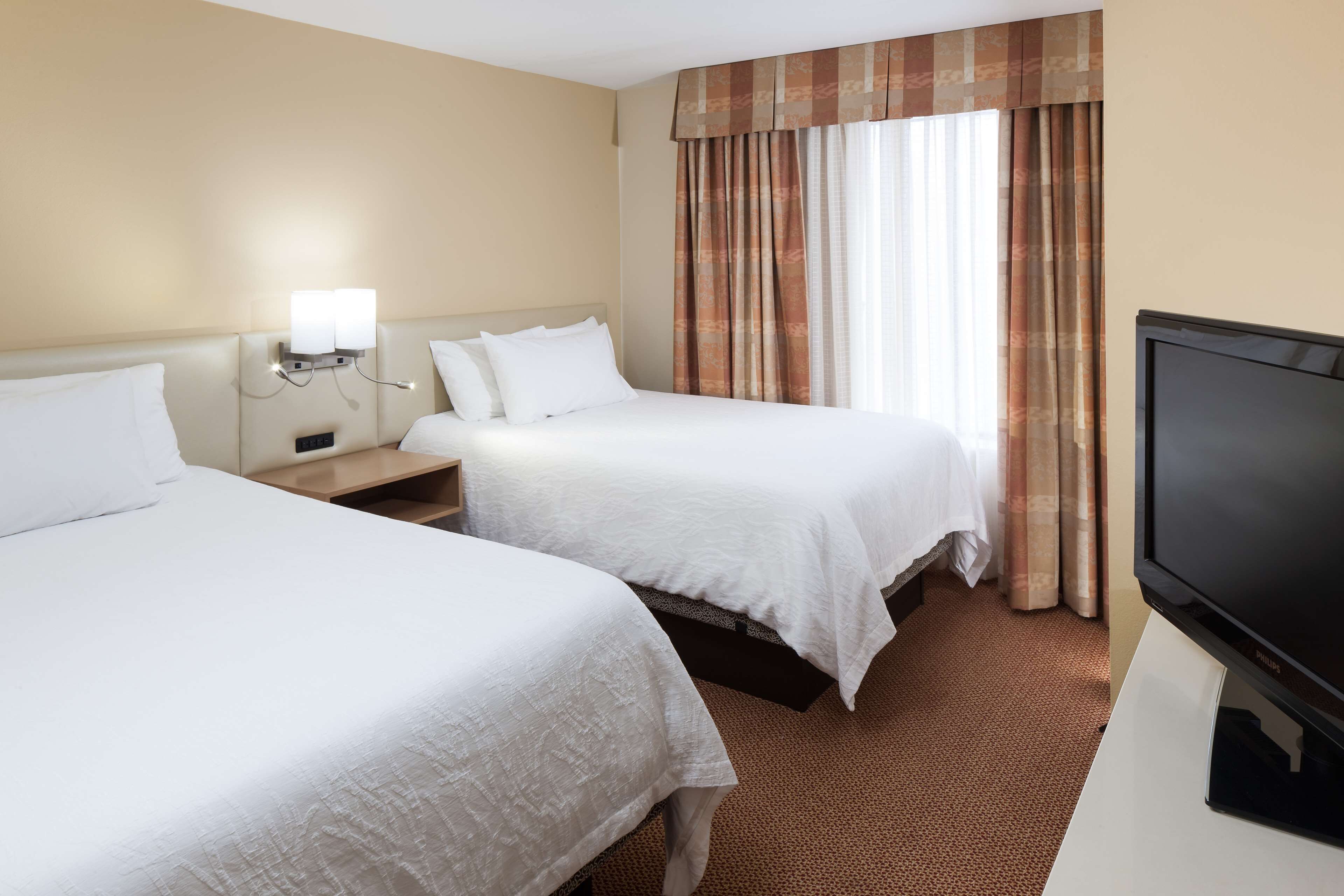 desk, laptop workspace, iron/ironing board, free cots/infant beds