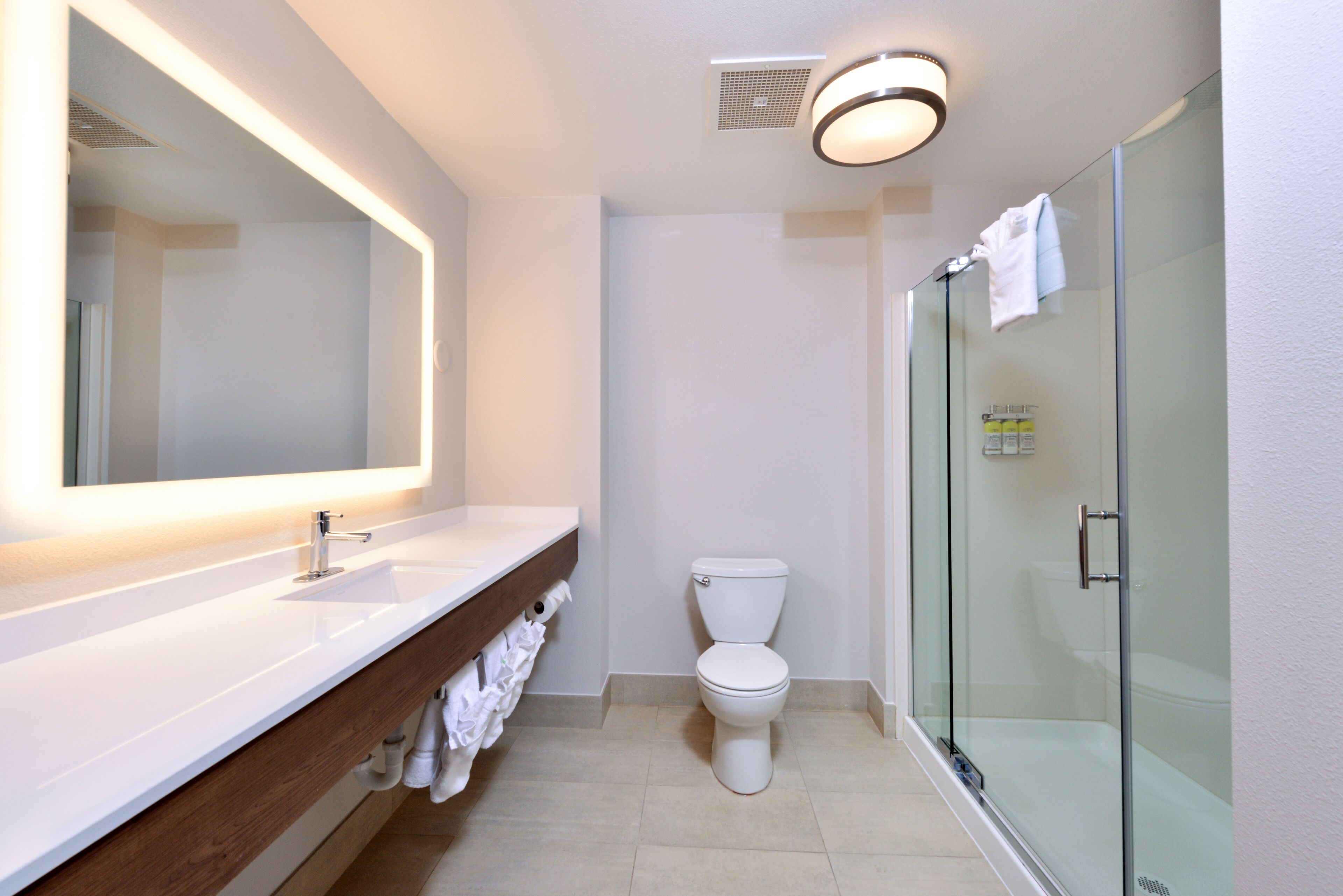 Suite, 1 King Bed | Bathroom | Combined shower/tub, free toiletries, hair dryer, towels