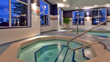 Indoor pool, open 8:00 AM to 10:00 PM, pool loungers