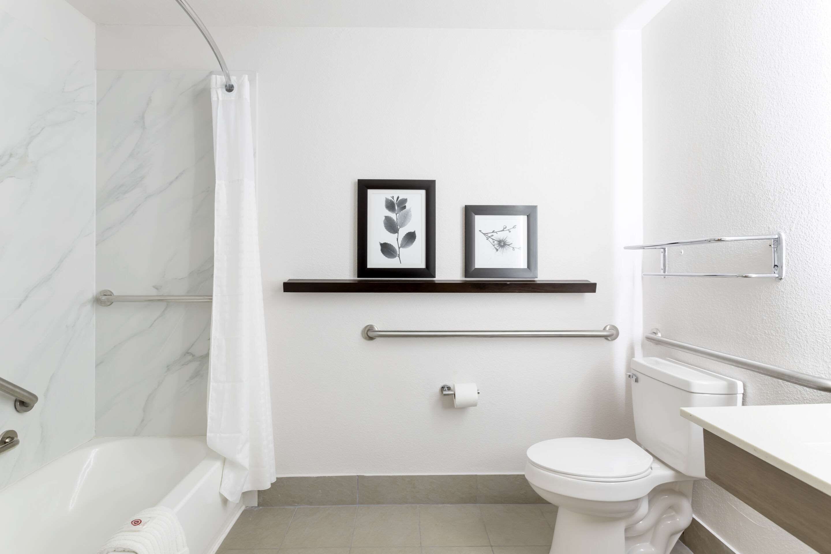 combined shower/bathtub, free toiletries, hair dryer, towels