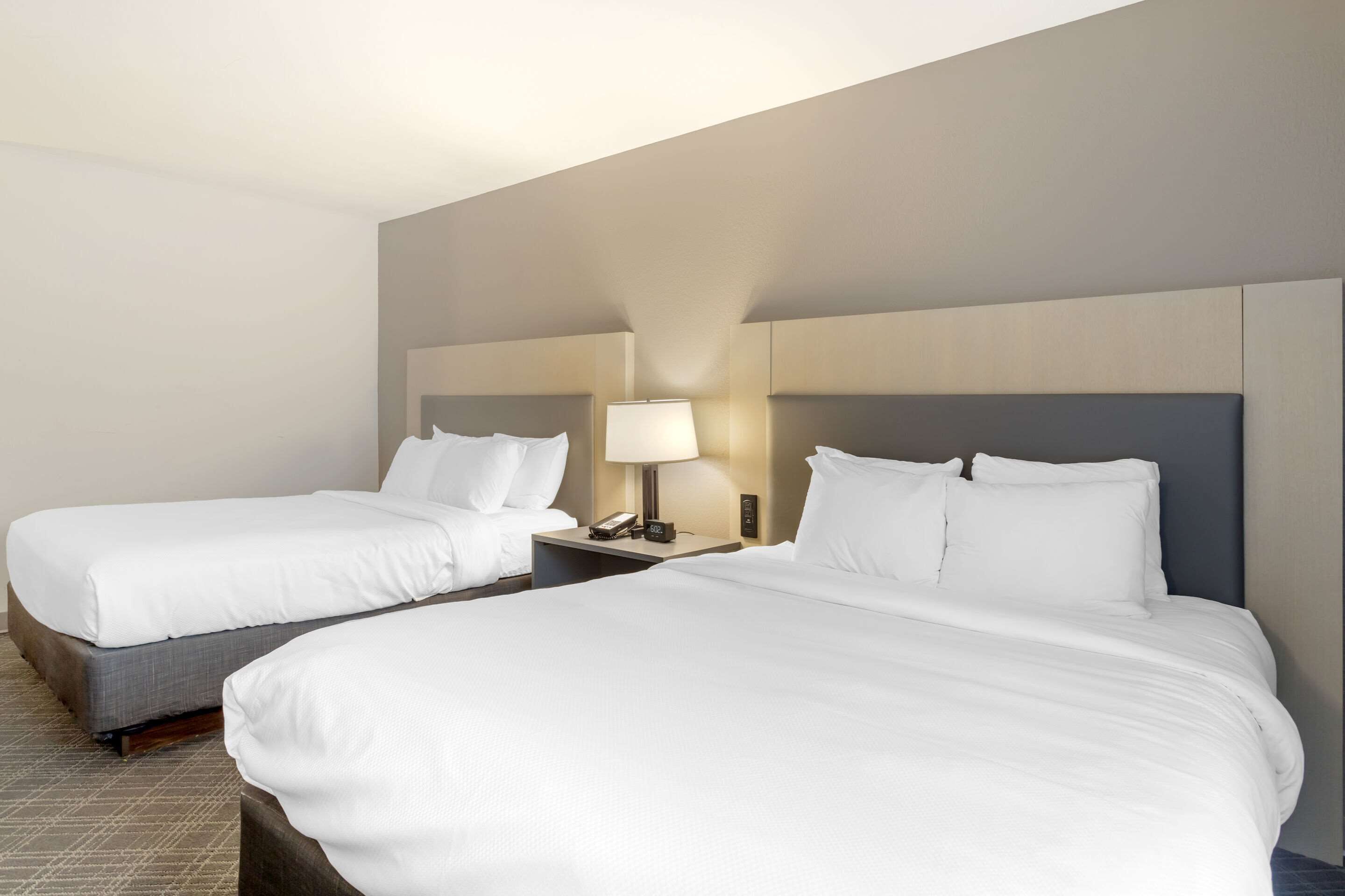 standard room, 2 queen beds, non smoking | in-room safe, desk, iron/ironing board, free cots/infant beds