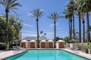 Outdoor pool, open 8:00 AM to 11:00 PM, free cabanas, sun loungers