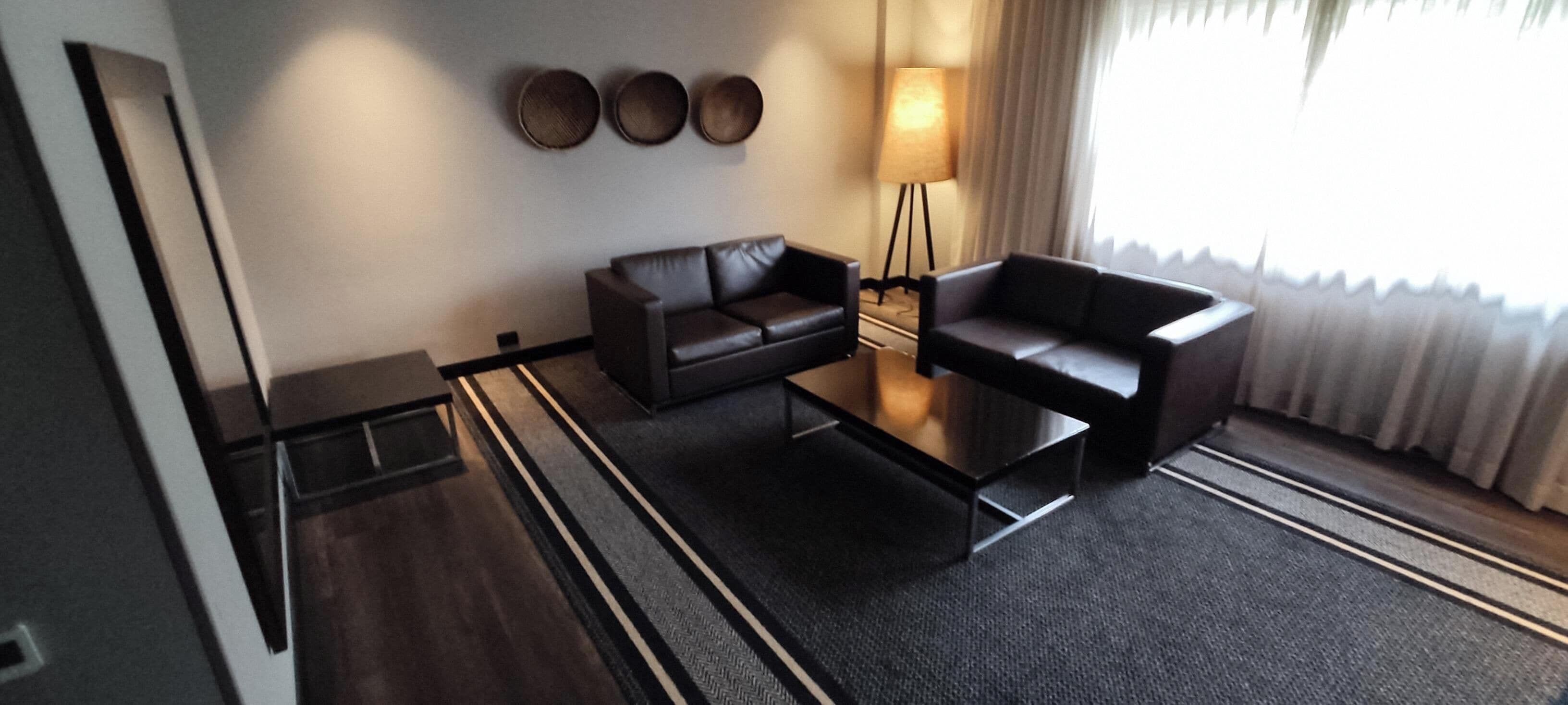 Junior Suite | Living area | 32-inch plasma TV with cable channels, TV