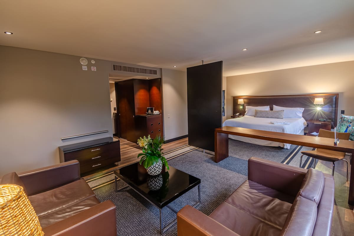 junior suite | 1 bedroom, desk, laptop workspace, blackout curtains