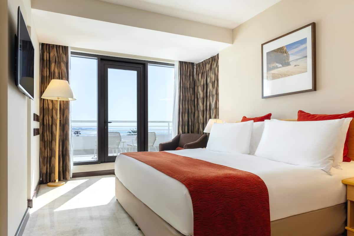 Junior Suite, 1 King Bed, Balcony | Down comforters, minibar, in-room safe, individually decorated