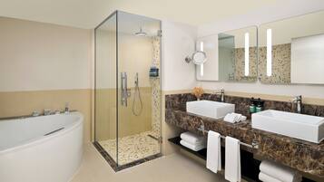 Suite, 2 Bedrooms, Balcony | Bathroom | Shower, rainfall showerhead, eco-friendly toiletries, hair dryer
