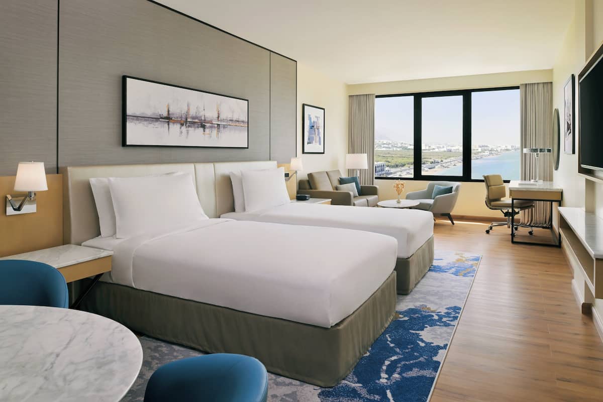 Family Room, 2 Queen Beds | Down comforters, minibar, in-room safe, desk
