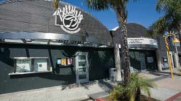 A building with a curved roof and a sign indicating it was established in 1974.