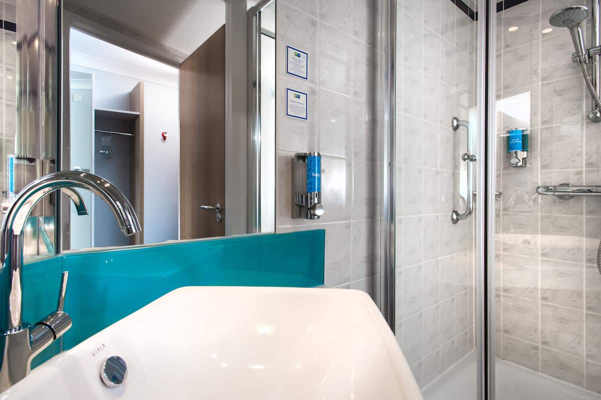 shower, eco-friendly toiletries, hair dryer, towels