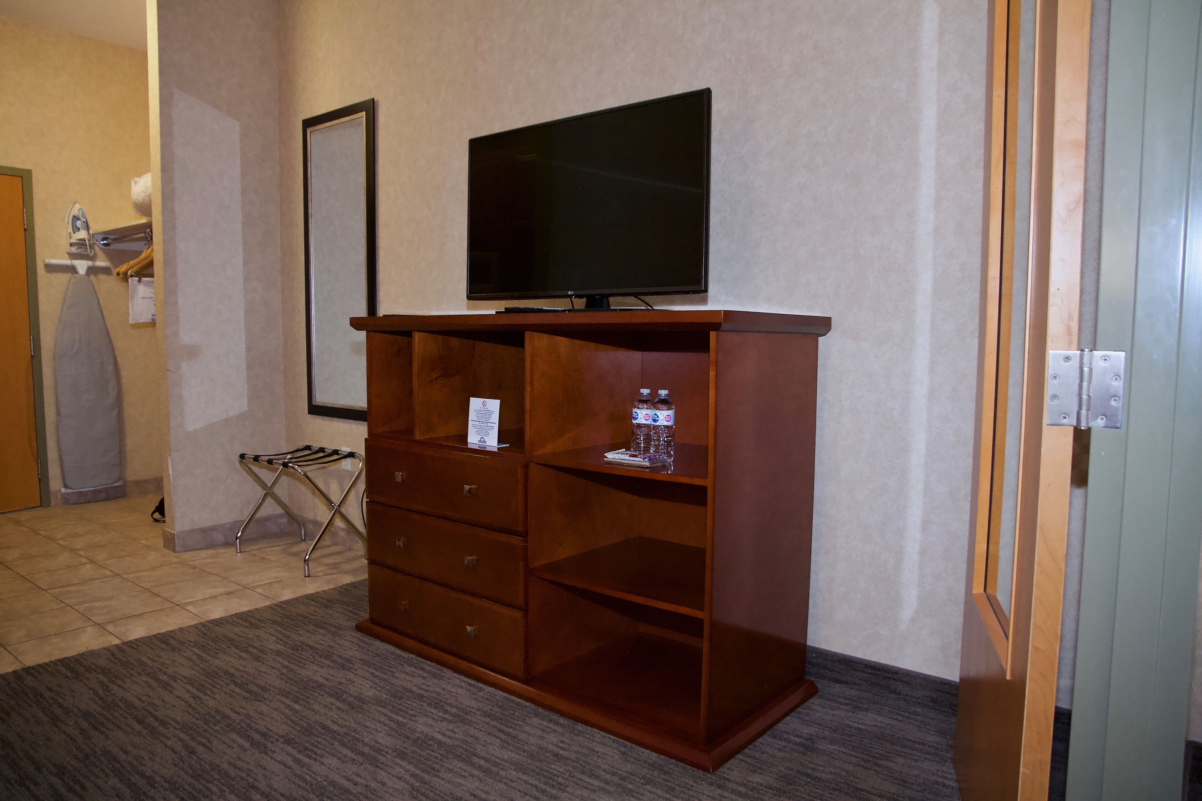 suite, 1 king bed with sofa bed, non smoking (two bedroom suite) | living area | 42-inch flat-screen tv with cable channels, tv