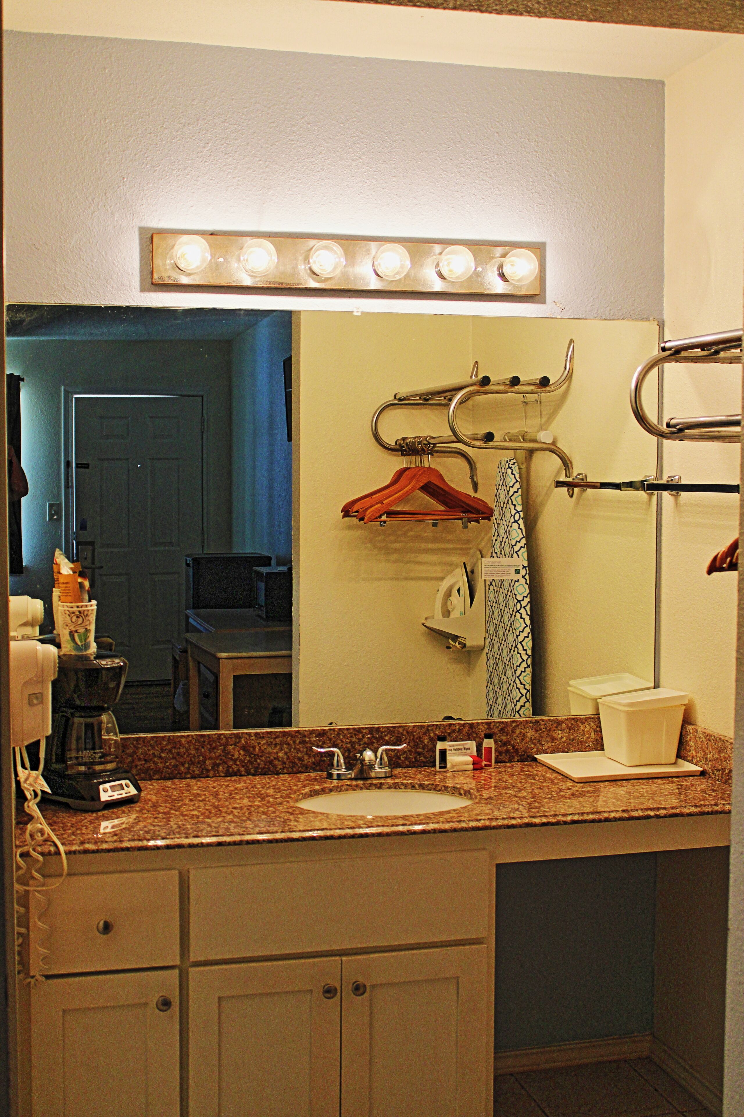 combined shower/bathtub, designer toiletries, hair dryer, towels