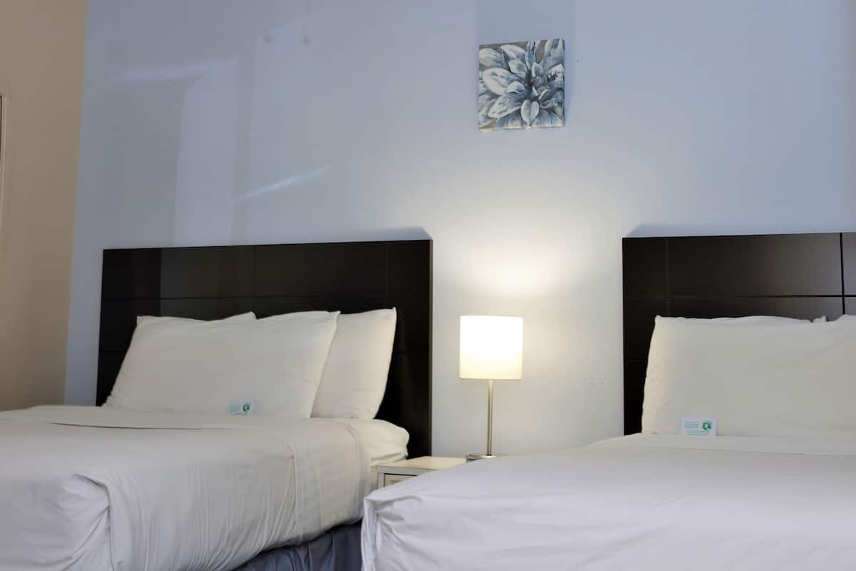 Standard Room, 2 Double Beds | In-room safe, soundproofing, iron/ironing board, cribs/infant beds
