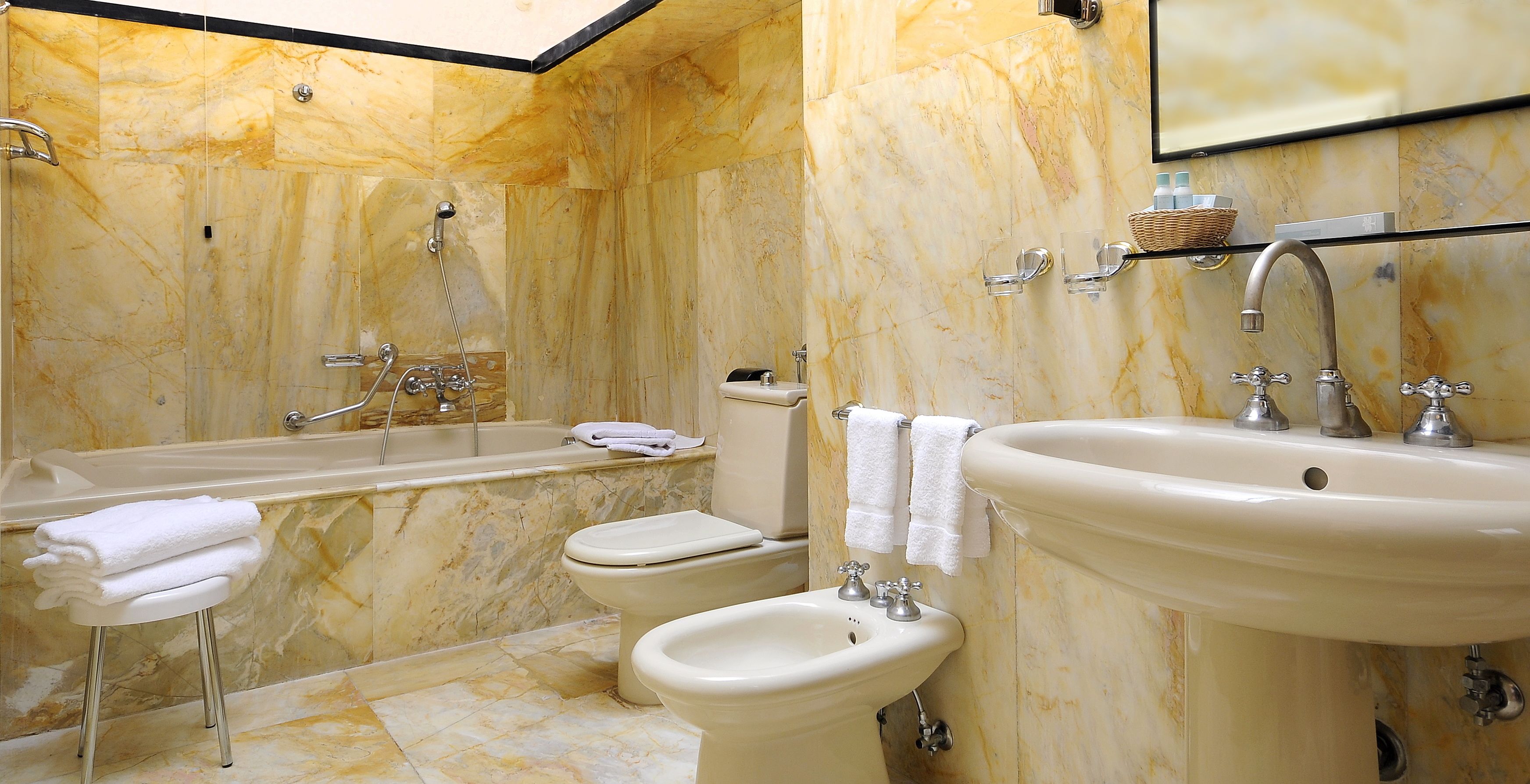 suite | bathroom | hair dryer, bidet, towels