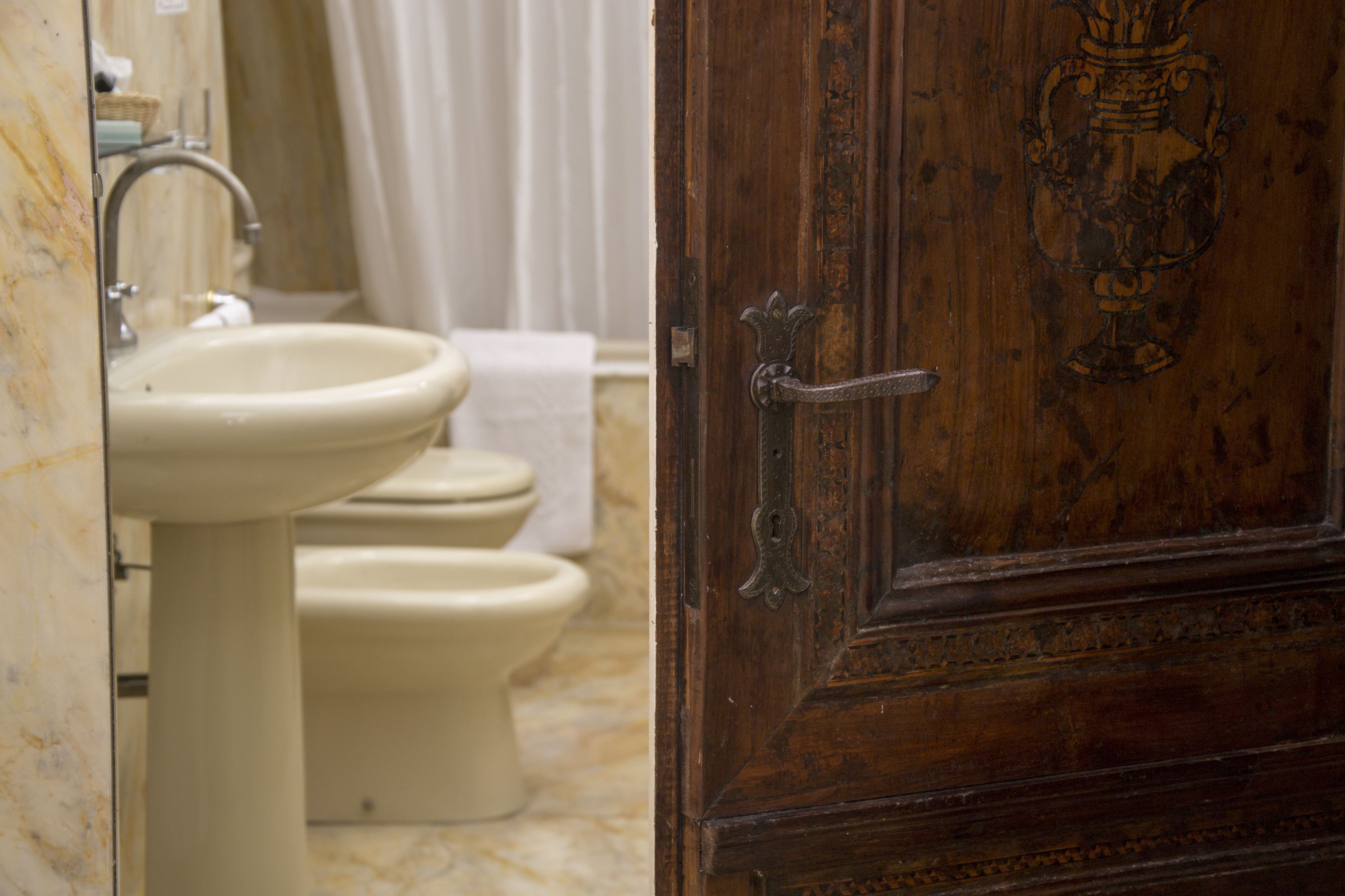 junior suite | bathroom | hair dryer, bidet, towels