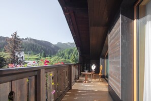 Luxe beddengoed, donsdekens, een kluis op de kamer