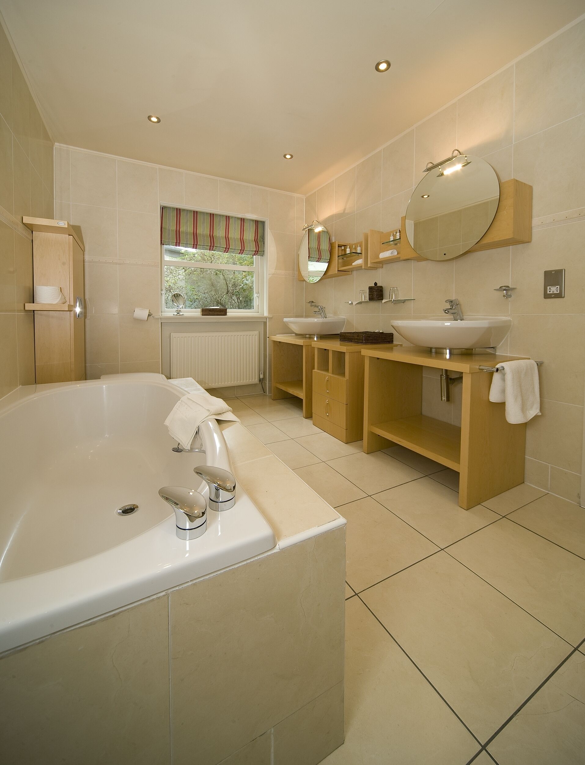 spa suite | bathroom | separate bathtub and shower, free toiletries, hair dryer, bathrobes