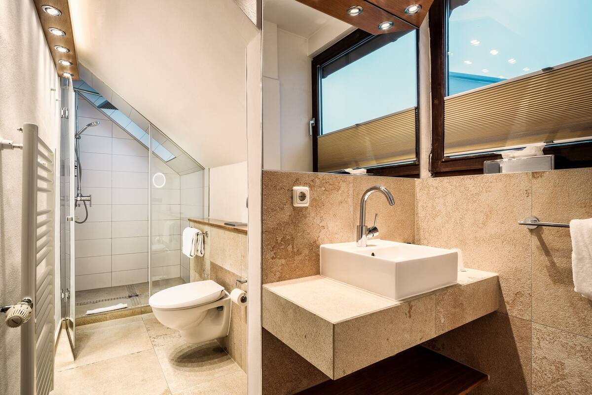 comfort double room | bathroom | hair dryer, towels