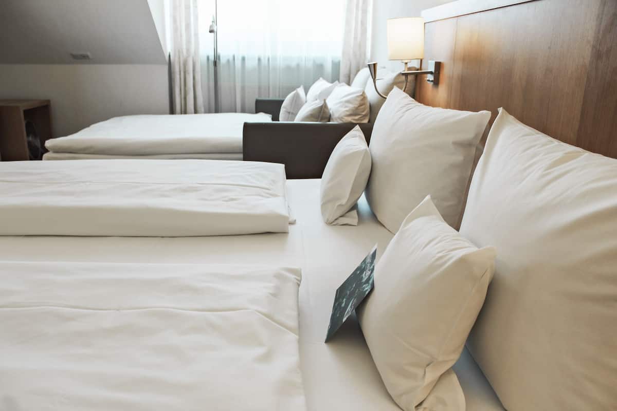Family Room | 1 bedroom, premium bedding, down comforters, minibar