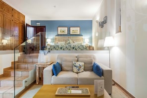 Habitación doble Deluxe, vista al jardín | 1 habitación, minibar y caja de seguridad en la habitación