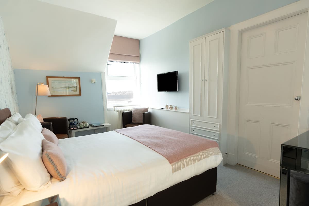 Premium bedding, individually furnished, desk, blackout curtains