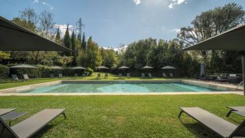 Outdoor pool, open 9:00 AM to 8:00 PM, pool umbrellas, sun loungers