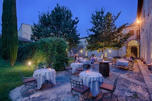 Dinner served, Italian cuisine, garden views 