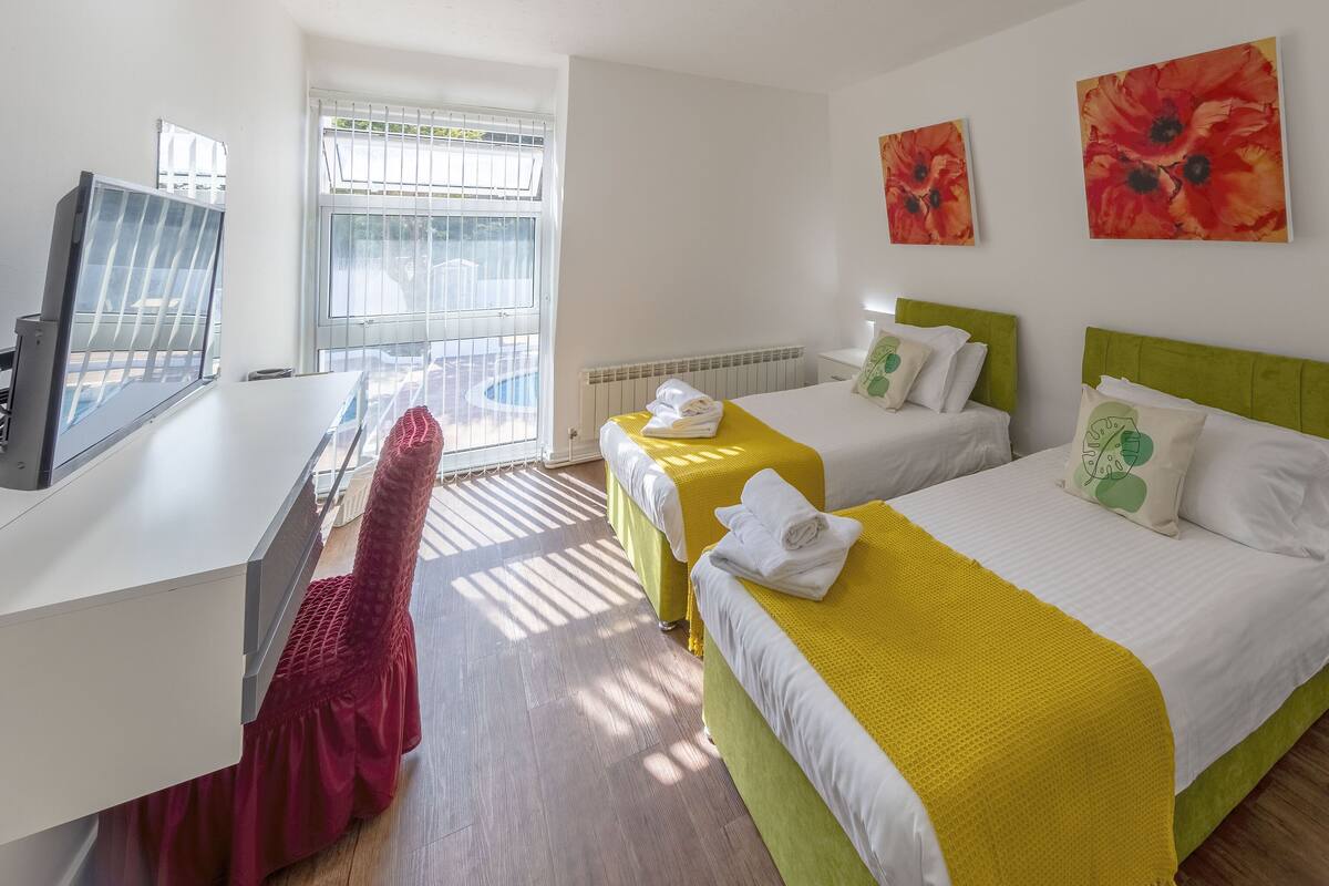 standard twin room | desk, iron/ironing board, bed sheets