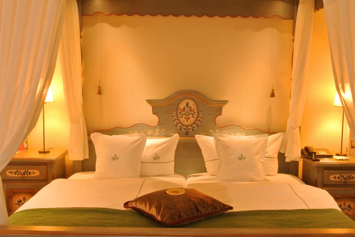 Hypo-allergenic bedding, down comforters, minibar, in-room safe