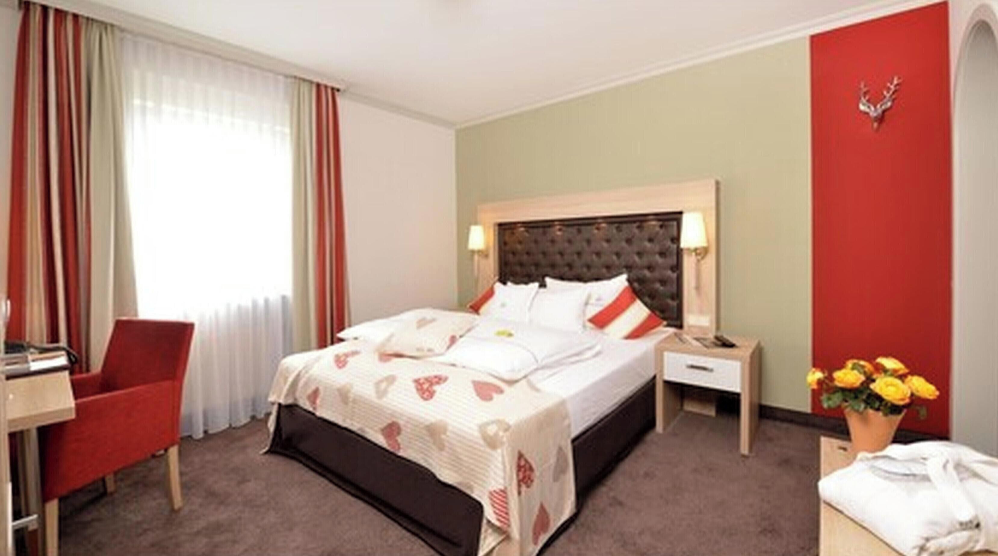 Hypo-allergenic bedding, down duvets, minibar, in-room safe