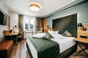 Enkeltrom | Allergitestet sengetøy, dundyner, minibar og safe på rommet