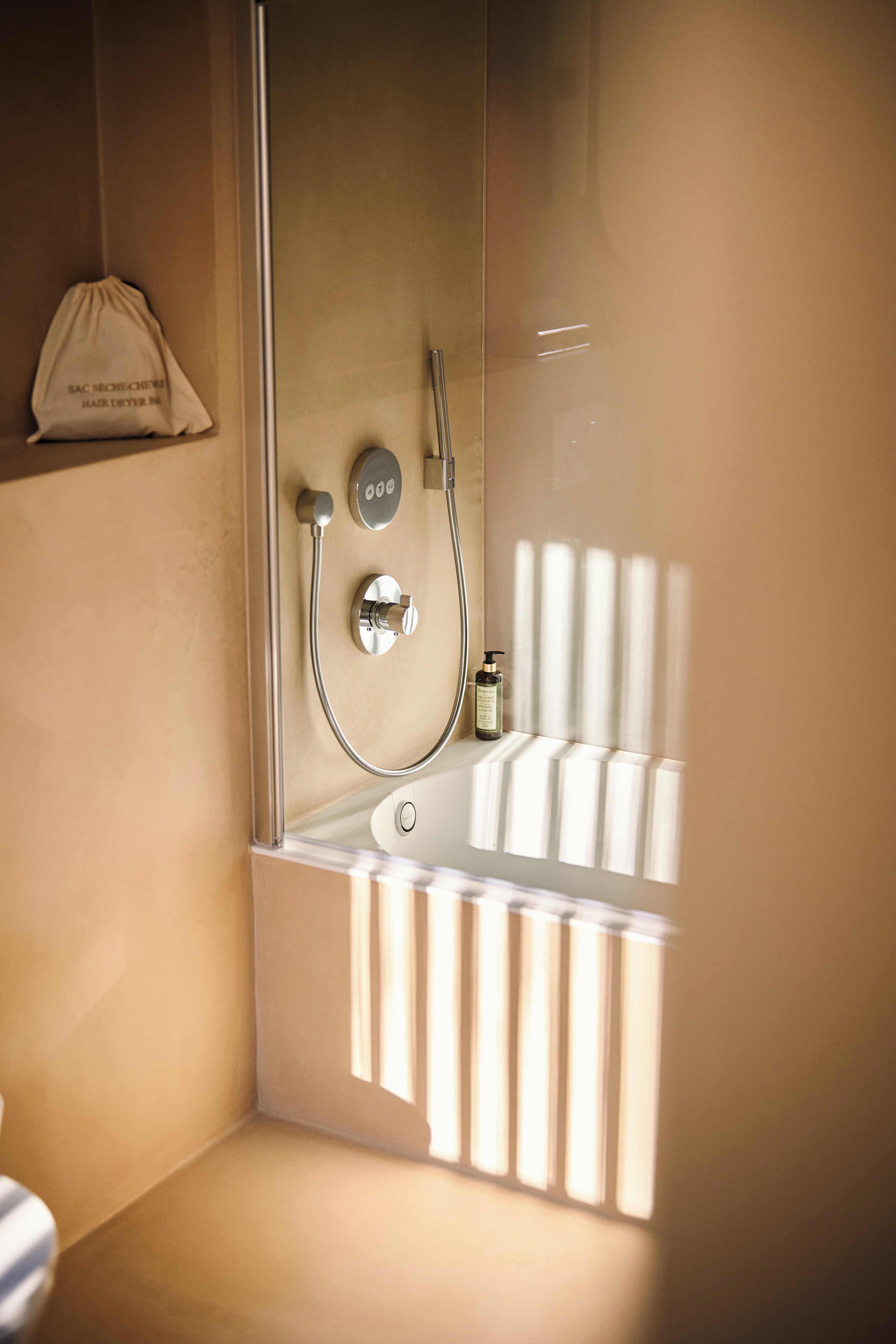 hair dryer, bathrobes, slippers, towels