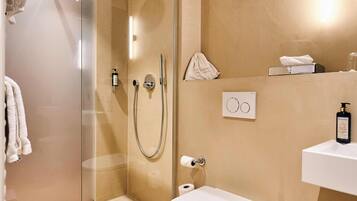 Hair dryer, bathrobes, slippers, towels