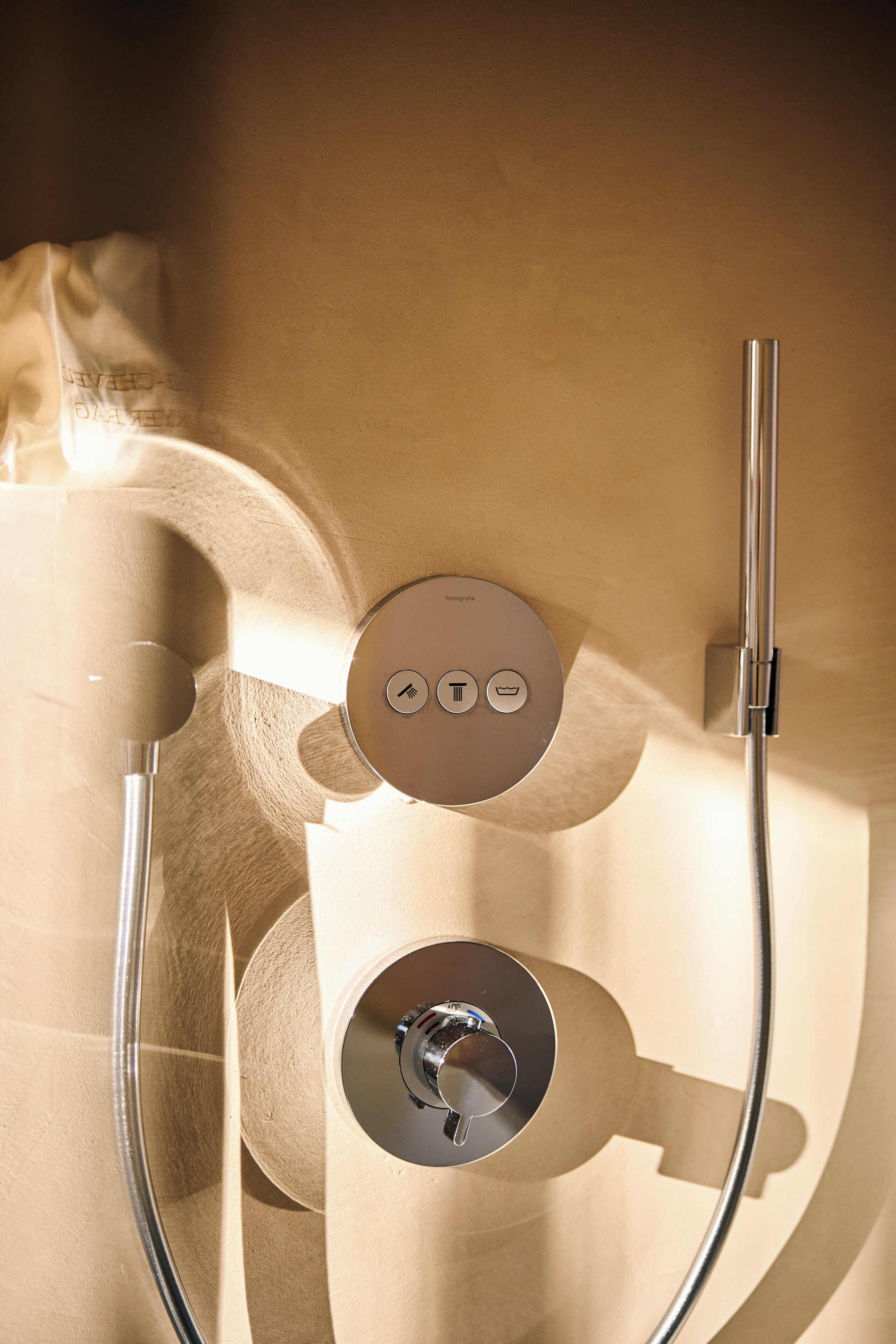 hair dryer, bathrobes, slippers, towels